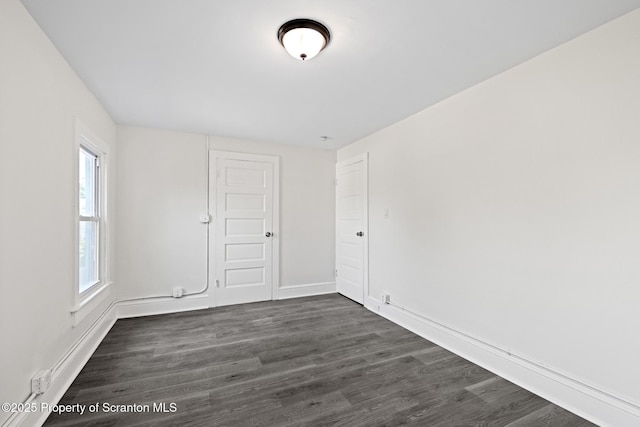 1303 Main St, Pittston, PA 18640 - empty room featuring dark wood-style floors