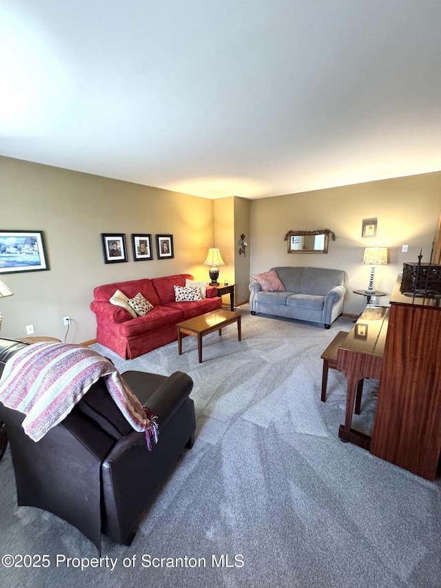 living area featuring carpet flooring