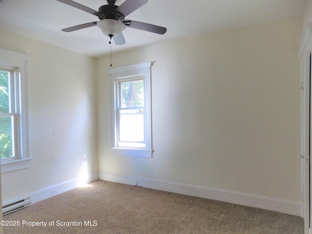 unfurnished room with ceiling fan, carpet floors, and baseboard heating