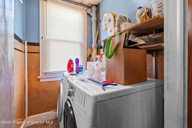 laundry room featuring laundry area and washer and clothes dryer