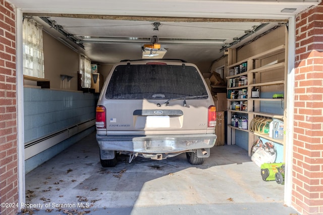 garage featuring a baseboard radiator