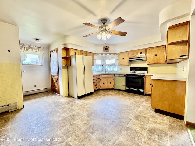 2052 Farr St 2050, Scranton, PA 18504 - kitchen featuring gas range, dishwashing machine, freestanding refrigerator, under cabinet range hood, and a baseboard heating unit