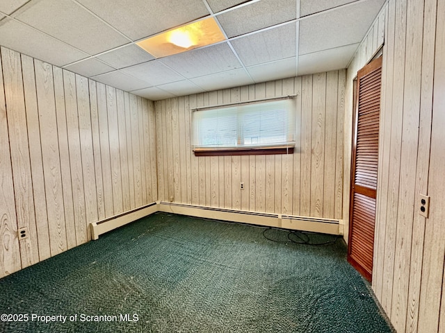 2052 Farr St 2050, Scranton, PA 18504 - carpeted spare room with wooden walls and a paneled ceiling