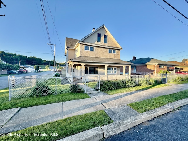 2052 Farr St 2050, Scranton, PA 18504 - view of front of house featuring covered porch, stucco siding, and a gate