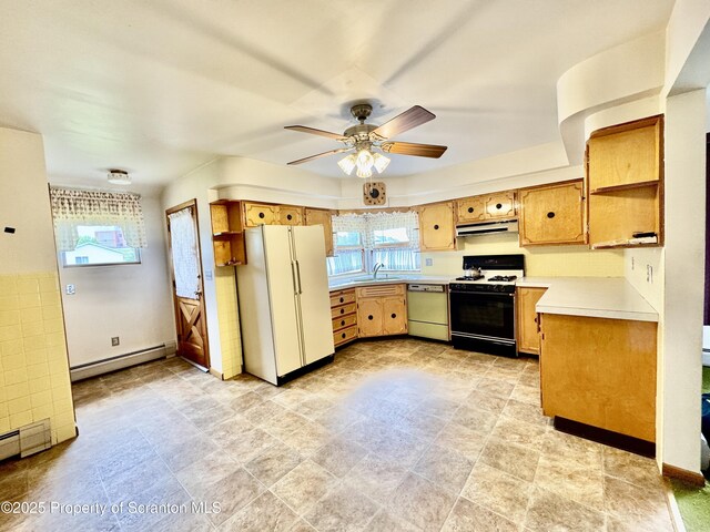 2052 Farr St 2050, Scranton, PA 18504 - kitchen featuring freestanding refrigerator, range with gas cooktop, dishwashing machine, a baseboard heating unit, and under cabinet range hood