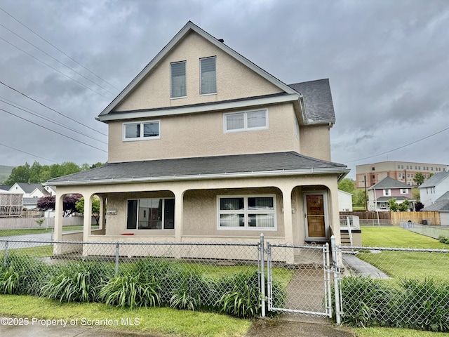 2052 Farr St 2050, Scranton, PA 18504 - view of front of property with covered porch, stucco siding, and a gate