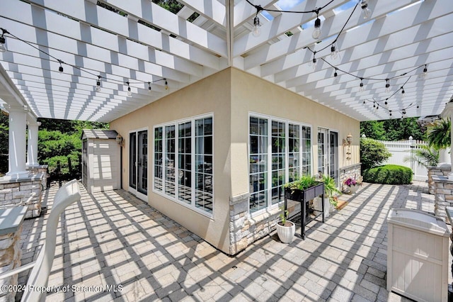 view of patio featuring a pergola