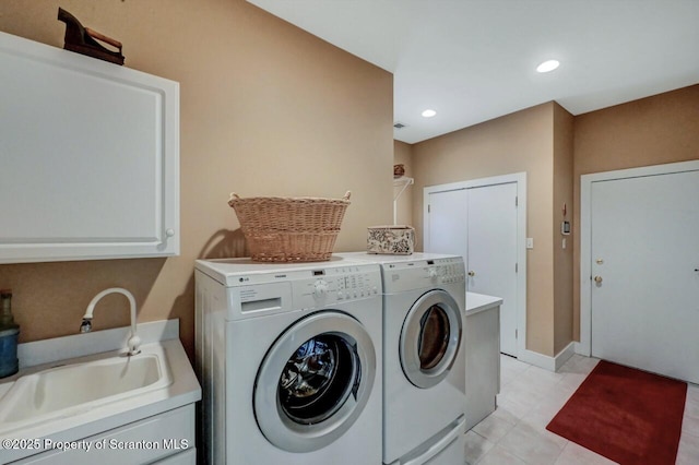 119 Glenmaura Dr, Moosic, PA 18507 - laundry area featuring separate washer and dryer, cabinet space, light tile patterned flooring, and recessed lighting