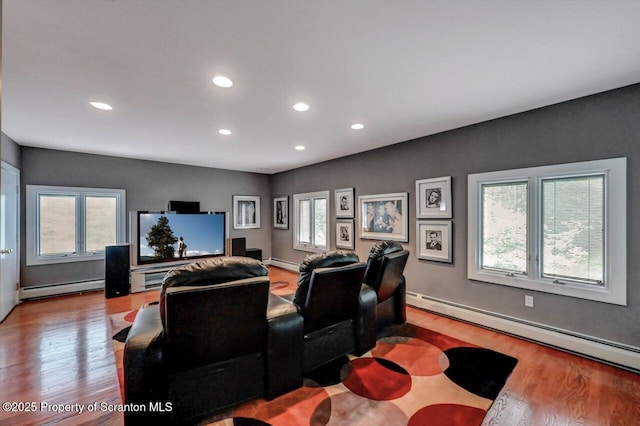 119 Glenmaura Dr, Moosic, PA 18507 - living area with a baseboard radiator, healthy amount of natural light, wood finished floors, and recessed lighting