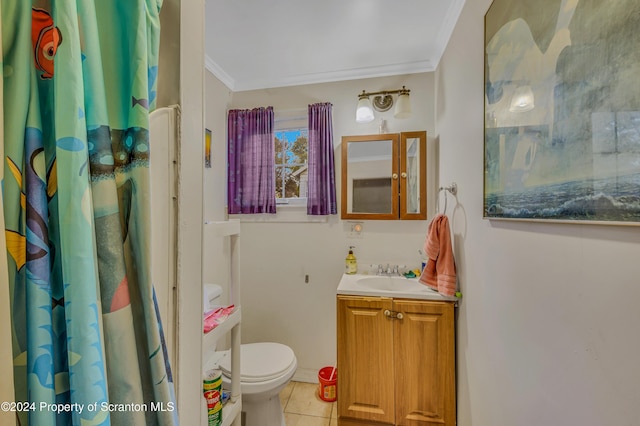 bathroom with toilet, vanity, tile patterned floors, and ornamental molding