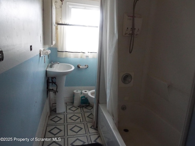 410 21st Ave, Scranton, PA 18504 - bathroom with shower / bath combo with shower curtain and a sink