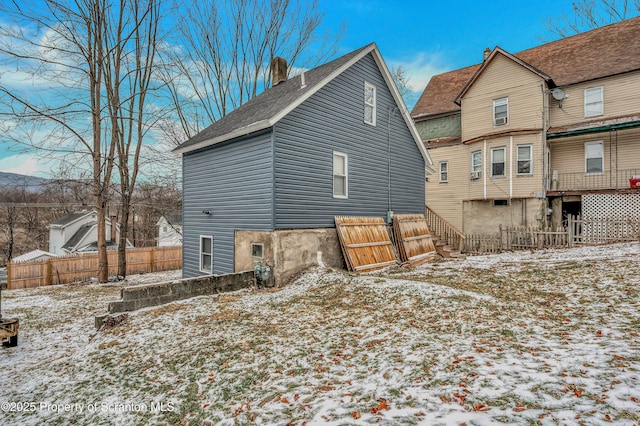 view of snow covered property