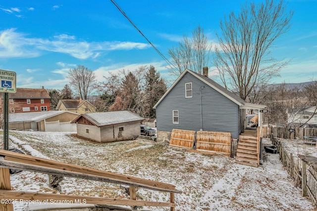 view of snow covered property