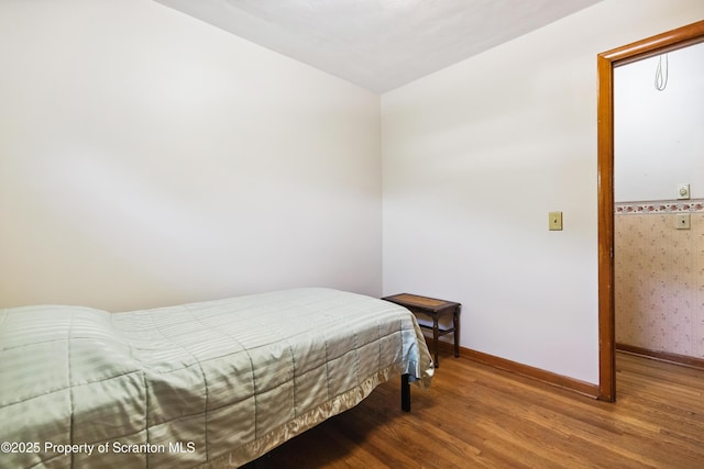 2807 S Webster Ave, Scranton, PA 18505 - bedroom with wood finished floors and wallpapered walls