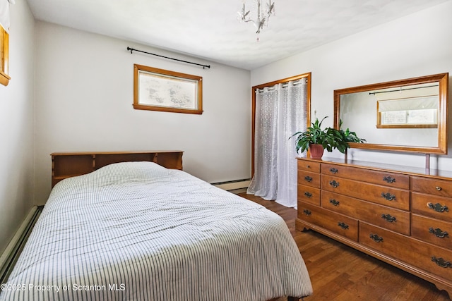 2807 S Webster Ave, Scranton, PA 18505 - bedroom with dark wood-type flooring and a baseboard radiator