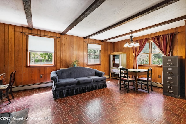2807 S Webster Ave, Scranton, PA 18505 - living area featuring brick patterned flooring, a baseboard heating unit, plenty of natural light, beam ceiling, and wooden walls