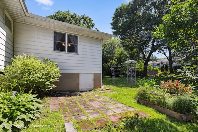 2807 S Webster Ave, Scranton, PA 18505 - view of yard with a vegetable garden and a patio