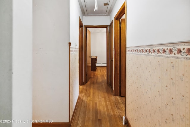 2807 S Webster Ave, Scranton, PA 18505 - hall featuring a baseboard heating unit, attic access, and hardwood / wood-style flooring