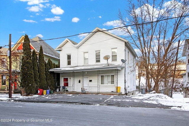 view of front property with covered porch