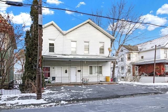 front facade with a porch