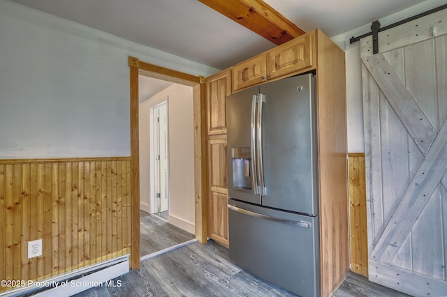326 Neptune Pl, Scranton, PA 18505 - kitchen with stainless steel refrigerator with ice dispenser, a barn door, dark wood finished floors, a wainscoted wall, and wood walls