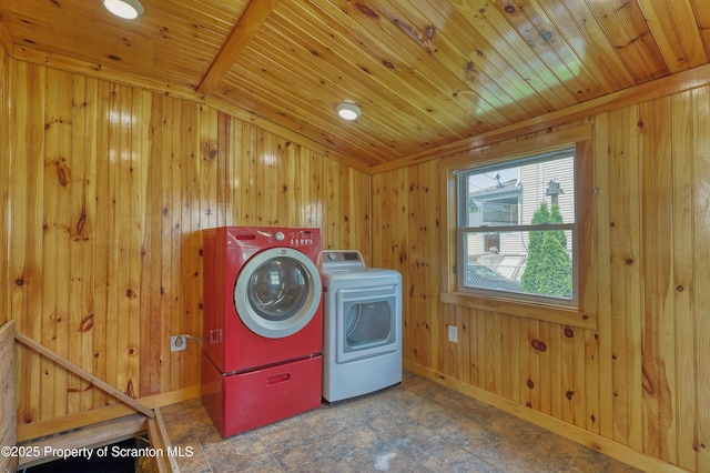326 Neptune Pl, Scranton, PA 18505 - laundry room featuring washing machine and clothes dryer, wood walls, and wooden ceiling