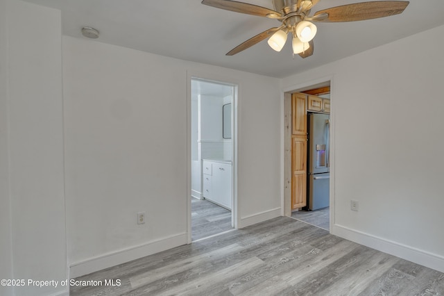 326 Neptune Pl, Scranton, PA 18505 - unfurnished room with light wood-style flooring, ceiling fan, and a smoke detector