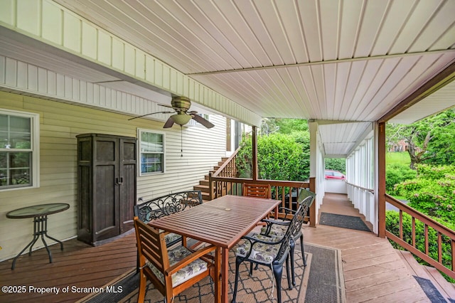 592 Gravel Pond Rd, Clarks Summit, PA 18411 - wooden deck with ceiling fan, outdoor dining area, and stairway