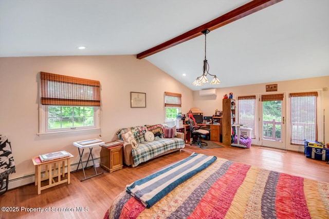 592 Gravel Pond Rd, Clarks Summit, PA 18411 - living room with wood finished floors, recessed lighting, a baseboard radiator, and a wall mounted AC