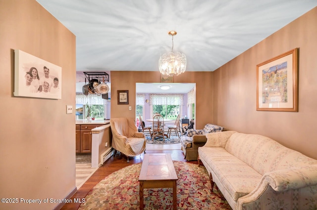 592 Gravel Pond Rd, Clarks Summit, PA 18411 - living area with light wood-type flooring and a chandelier