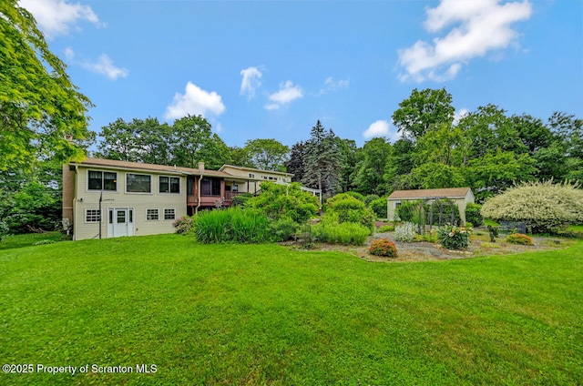 592 Gravel Pond Rd, Clarks Summit, PA 18411 - view of grassy yard with a deck