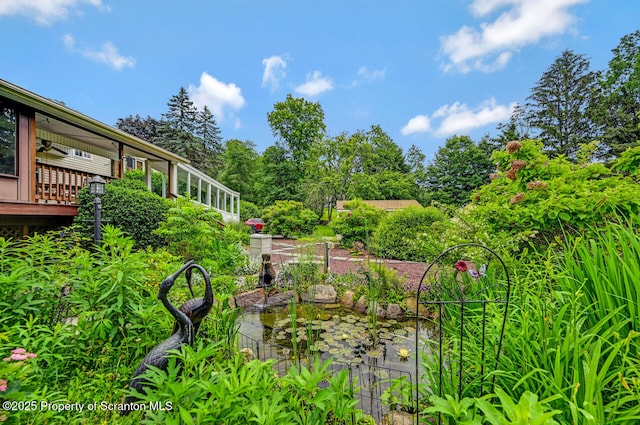 592 Gravel Pond Rd, Clarks Summit, PA 18411 - view of yard with a ceiling fan and a deck