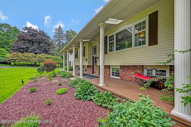 592 Gravel Pond Rd, Clarks Summit, PA 18411 - view of side of home with a yard and a patio