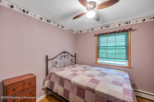 592 Gravel Pond Rd, Clarks Summit, PA 18411 - bedroom featuring baseboard heating and a ceiling fan