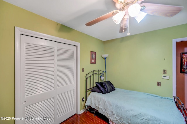 592 Gravel Pond Rd, Clarks Summit, PA 18411 - bedroom featuring a closet, dark wood-type flooring, and a ceiling fan
