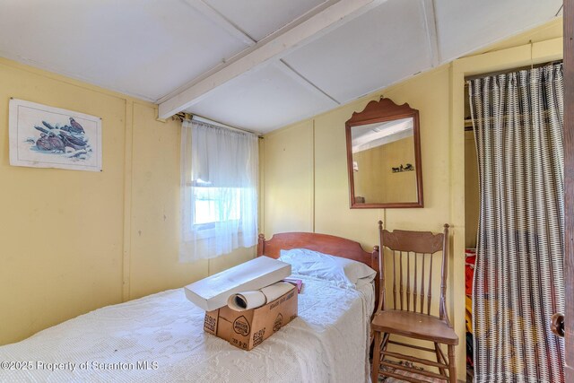 272 Lake Blvd, Clifford Twp, PA 18470 - bedroom with lofted ceiling with beams