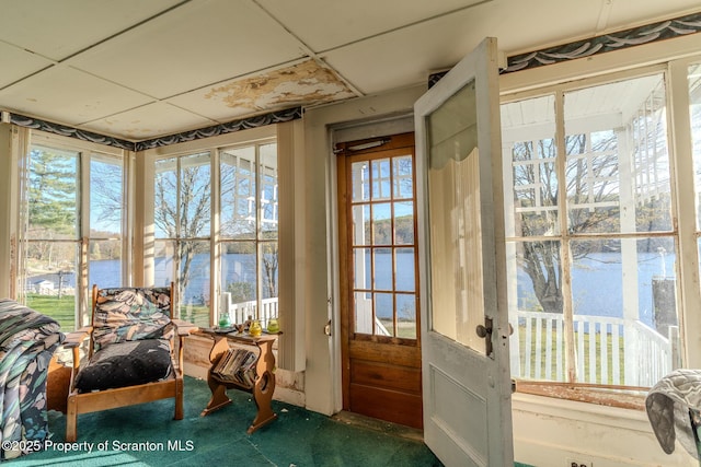 272 Lake Blvd, Clifford Twp, PA 18470 - entryway featuring a water view and carpet floors