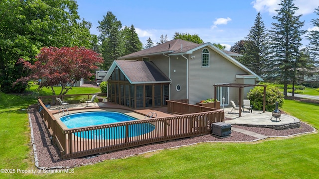 73 Quinton Rd, Scott Twp, PA 18447 - view of pool featuring a sunroom, a patio area, and a yard