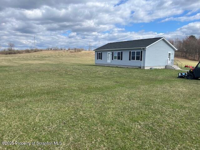 view of front of home with a front lawn