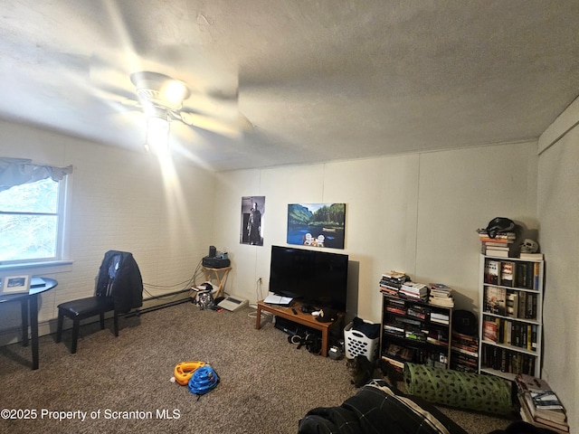 rec room with carpet flooring, a textured ceiling, and ceiling fan