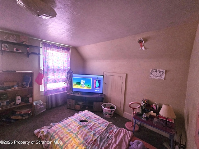 carpeted bedroom featuring a textured ceiling, radiator, and vaulted ceiling