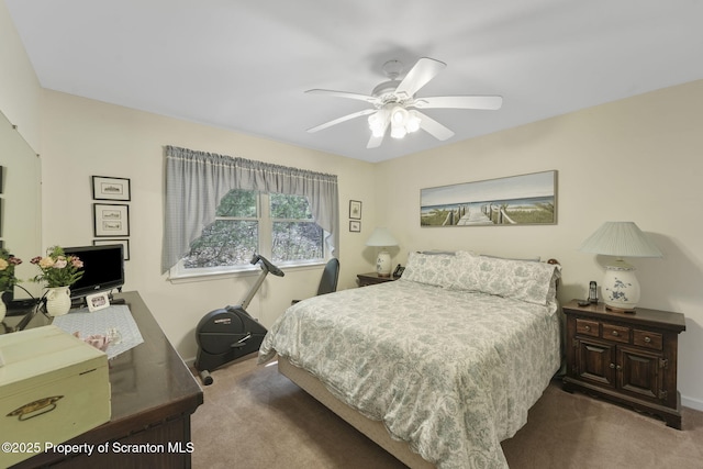 bedroom featuring carpet flooring and a ceiling fan