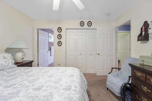 bedroom featuring a ceiling fan, carpet, and a closet