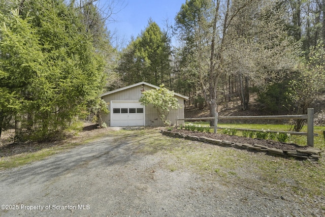 exterior space with dirt driveway