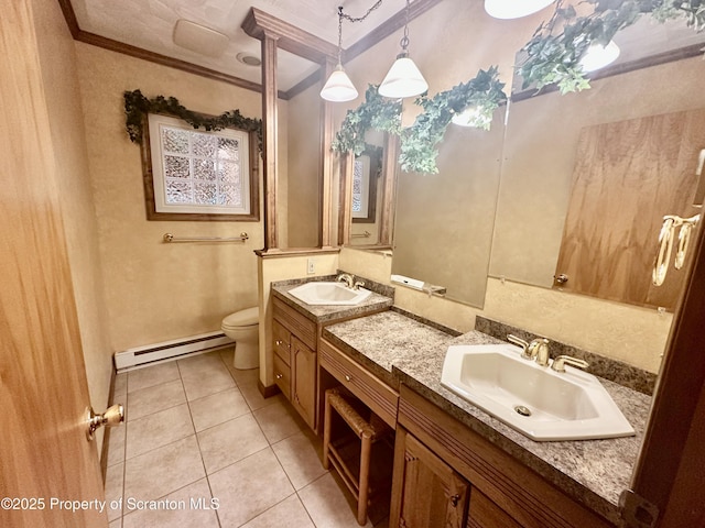 290 Holly Ln, Sturges, PA 18447 - bathroom with a baseboard heating unit, ornamental molding, double vanity, and tile patterned flooring