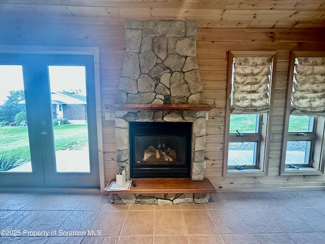 290 Holly Ln, Sturges, PA 18447 - detailed view of wood ceiling, wood walls, french doors, and a stone fireplace