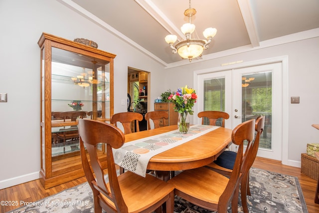 210 Willow Dr, Jefferson Twp, PA 18436 - dining area featuring french doors, a chandelier, light wood-style floors, and baseboards