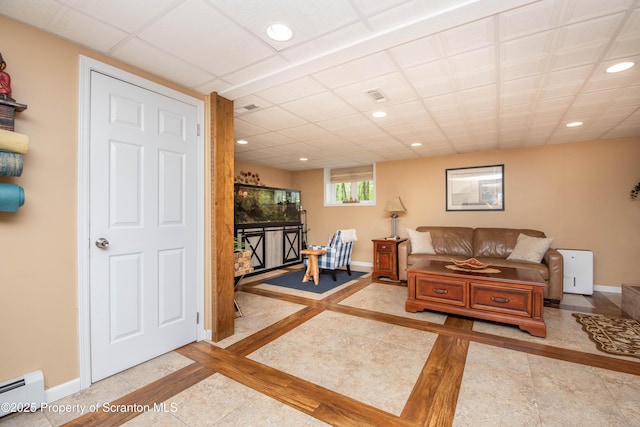 210 Willow Dr, Jefferson Twp, PA 18436 - living area with baseboard heating, inlaid floor details, baseboards, and recessed lighting