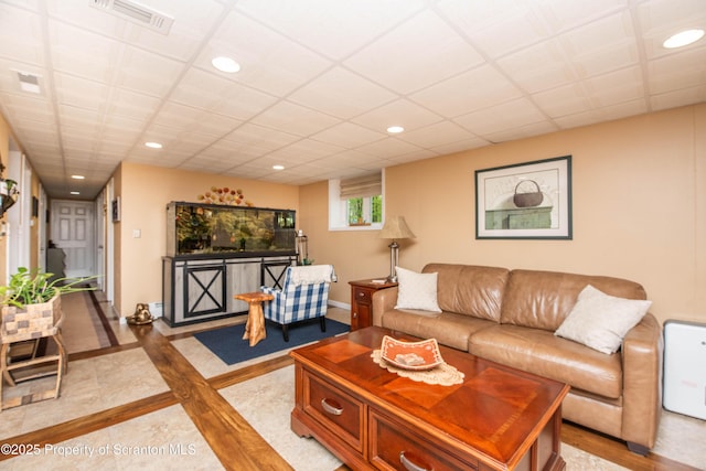210 Willow Dr, Jefferson Twp, PA 18436 - living room featuring recessed lighting, inlaid floor details, and baseboards