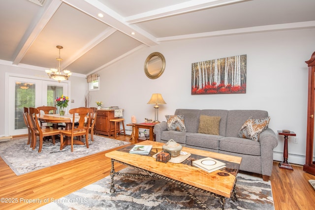 210 Willow Dr, Jefferson Twp, PA 18436 - living area with a chandelier, wood finished floors, and a baseboard heating unit
